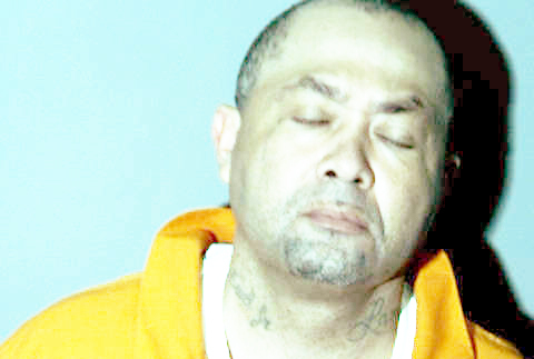 Man on parole arrested after allegedly trying to pass counterfeit money