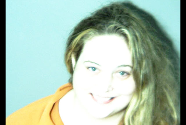 Woman arrested for allegedly forging signature on checks