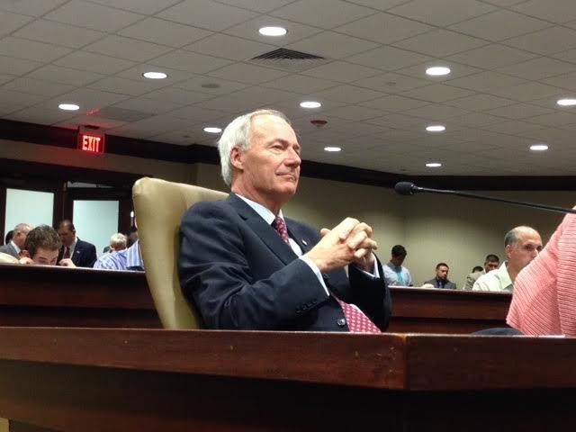 Hutchinson continues to seek middle ground on private option