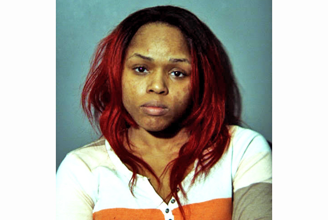 Woman arrested after alleged armed disturbance Saturday