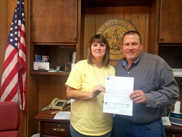 Arkansas County receives check