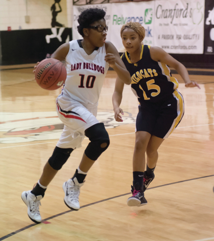 Martin spurs Lady Cats to win over rival