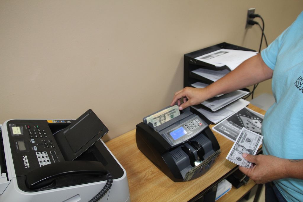 Tax collector plans changes after receiving counterfeit cash