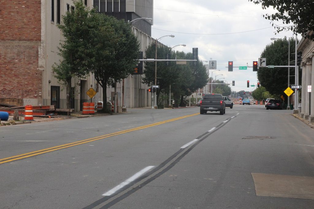 Debris-strewn block of downtown Main Street reopens