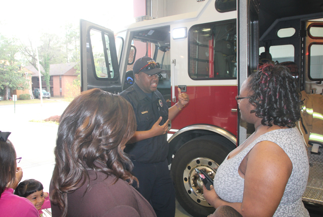 Kids, parents get close look at firemen, station