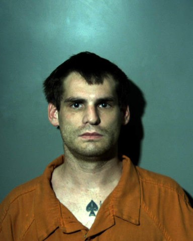 Man allegedly drove truck through motel room wall