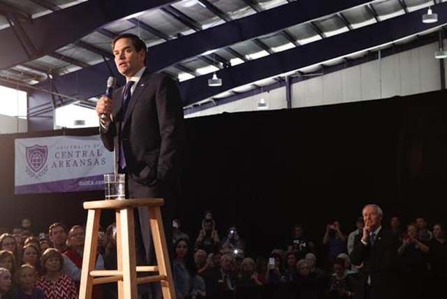Rubio campaigns with Arkansas governor on eve of Super Tuesday