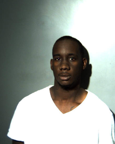 Man arrested after allegedly pointing gun at another man