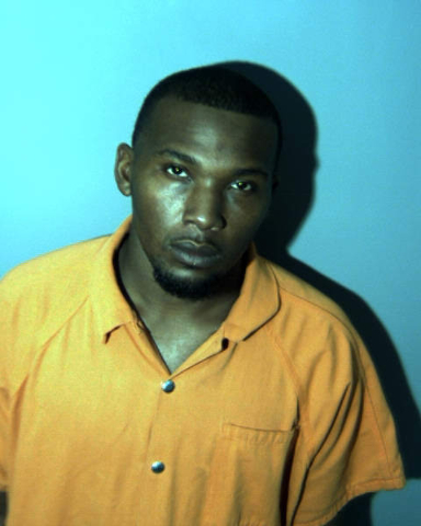 Man accused of murder arrested on drug, gun charges