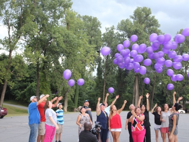 Balloon release honors memory of slain woman