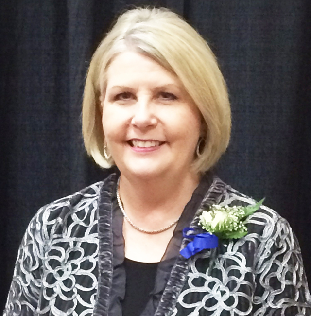 National Extension officials honor Cleveland County agent