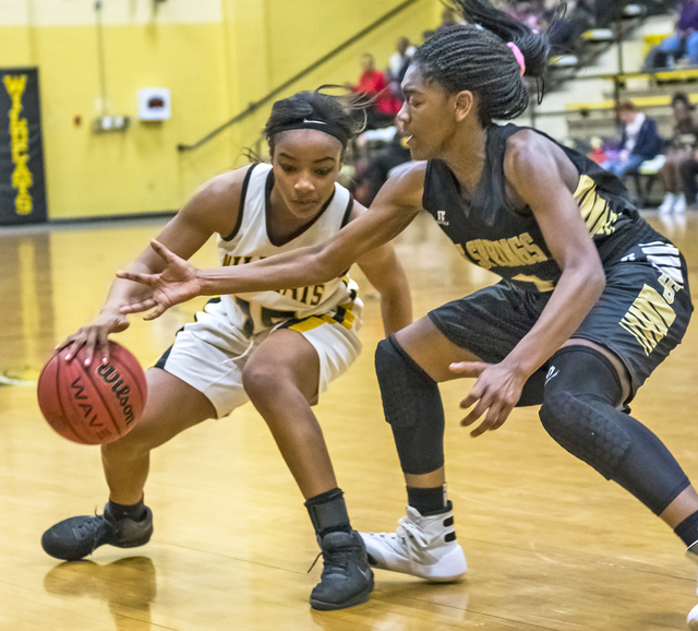Wildcats hold off Trojans for key win