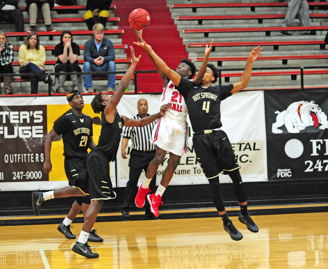 Preps Roundup: Trojans tame Bulldogs