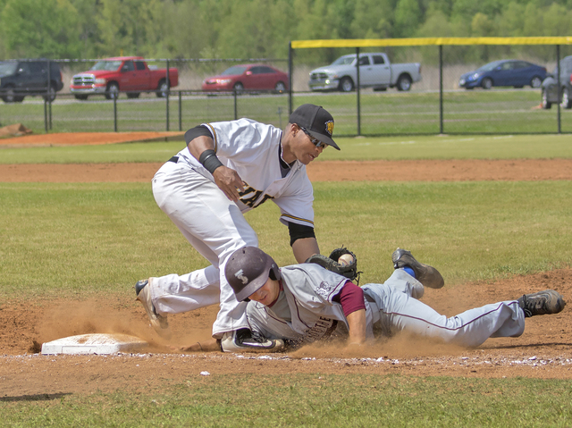 Lions sweep Tigers, move back into first place tie