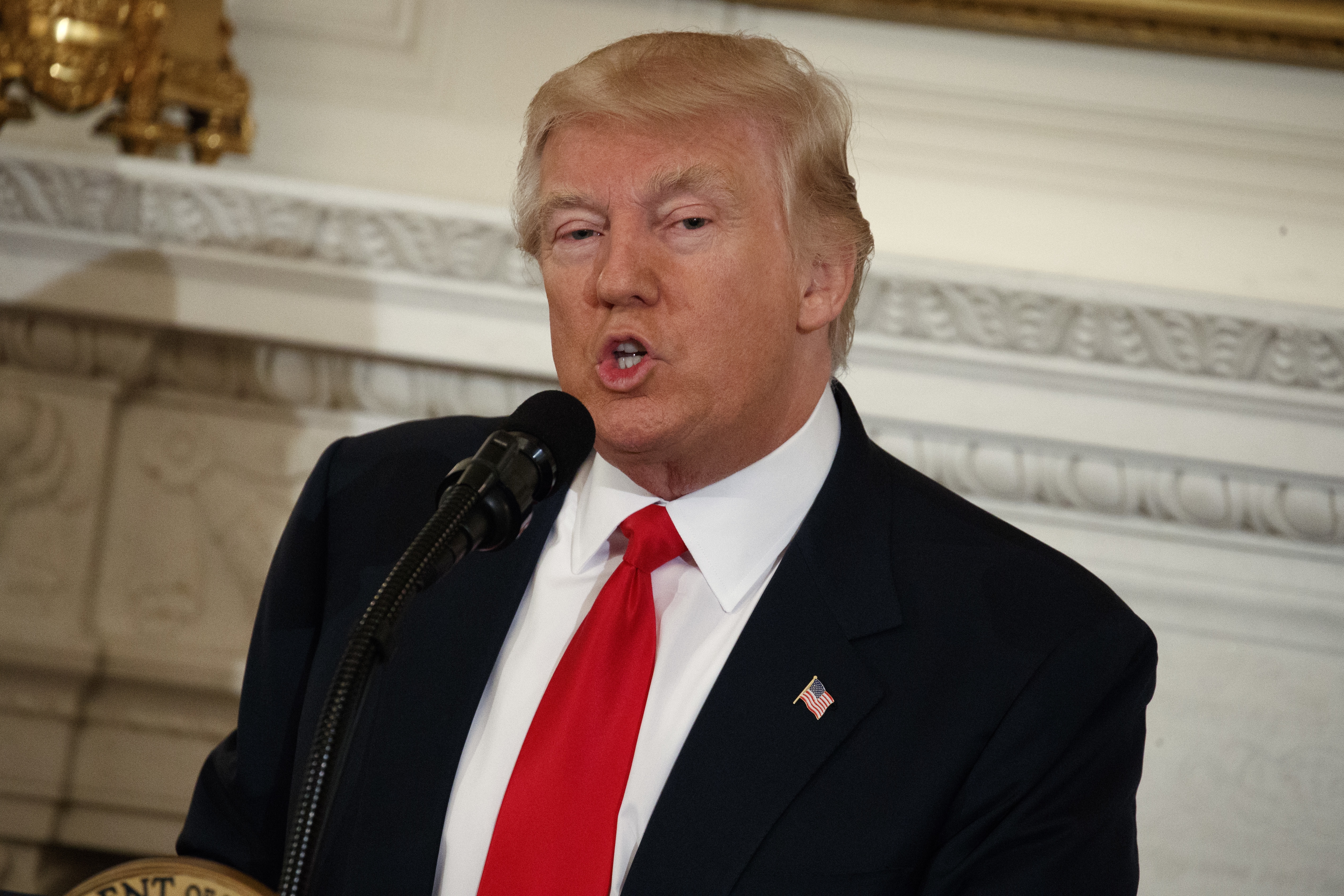 Trump looks to refocus his presidency in address to Congress