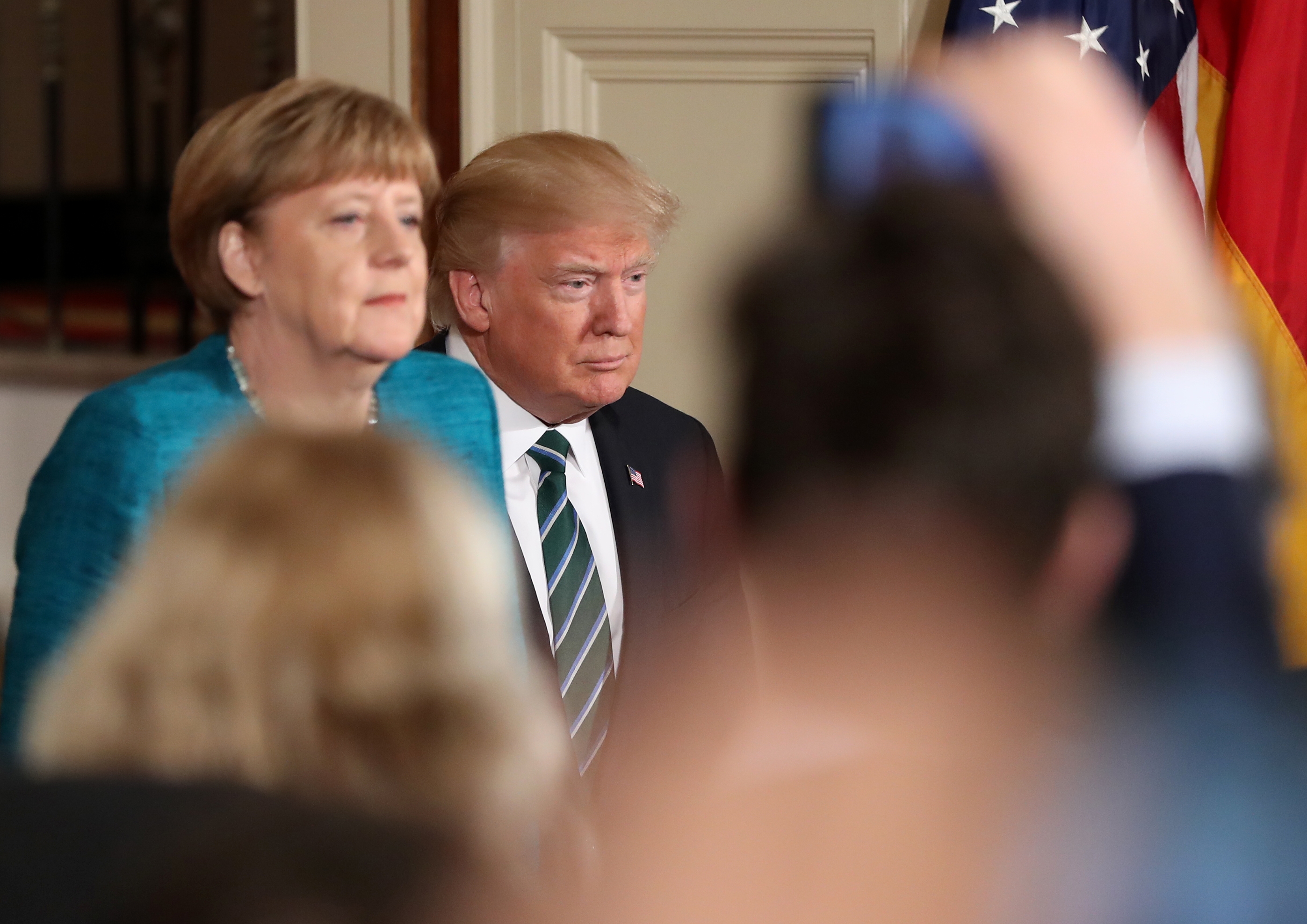 Trump repeats wiretap claim; suggests he, Merkel ‘have something in common, perhaps’
