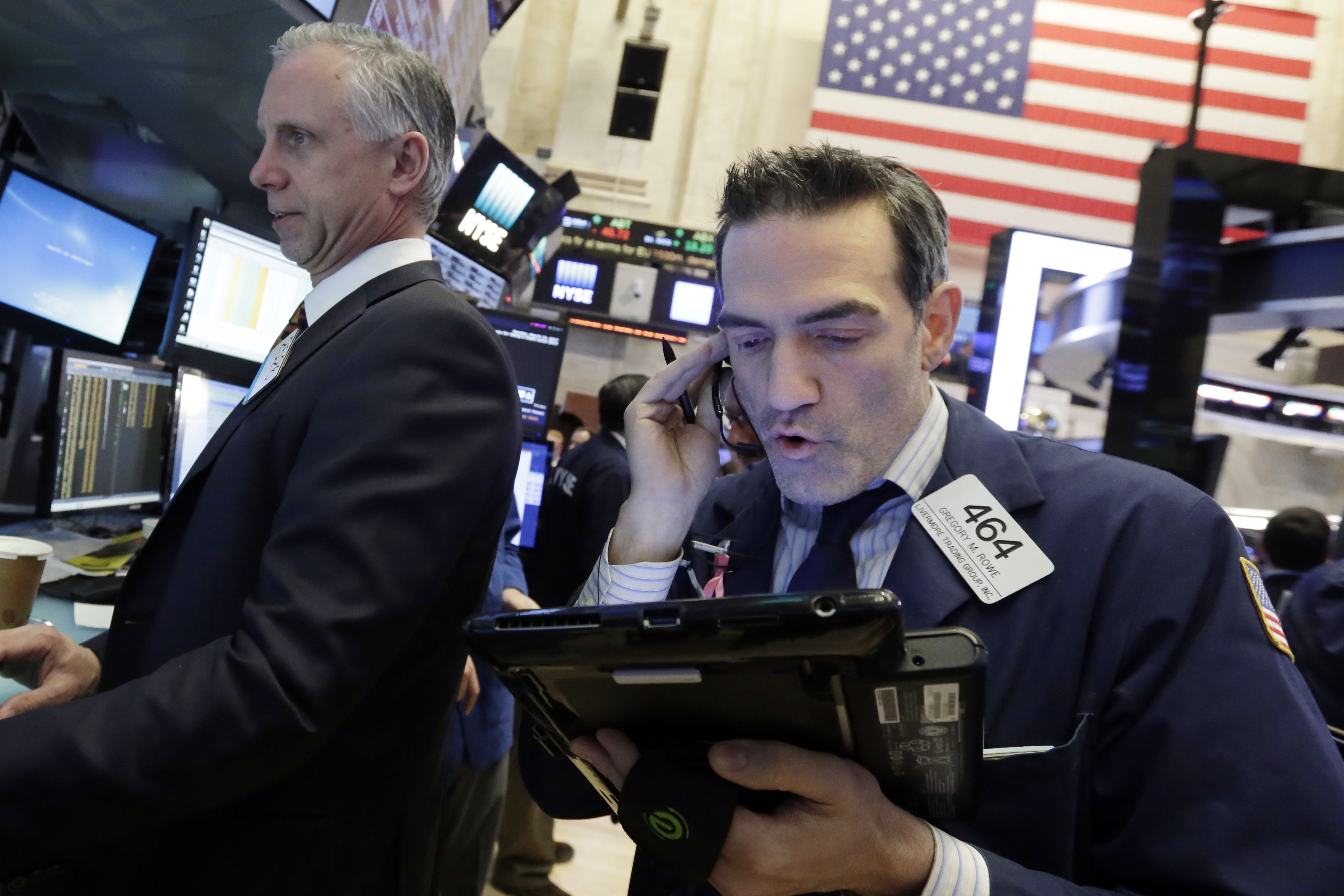 CLOSING BELL: Stocks steady at beginning of jam-packed week