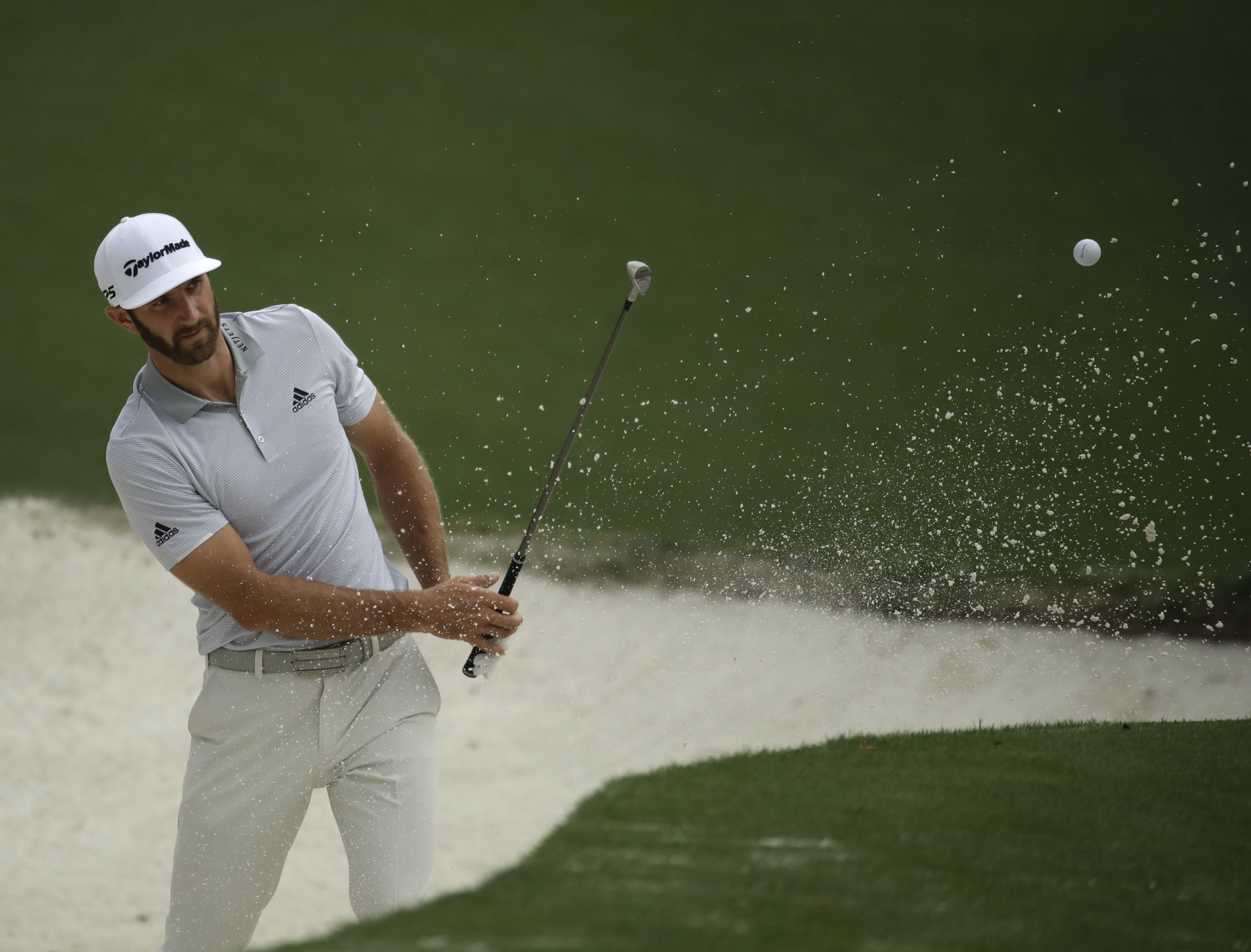 Johnson falls down stairs, hopes to play Masters