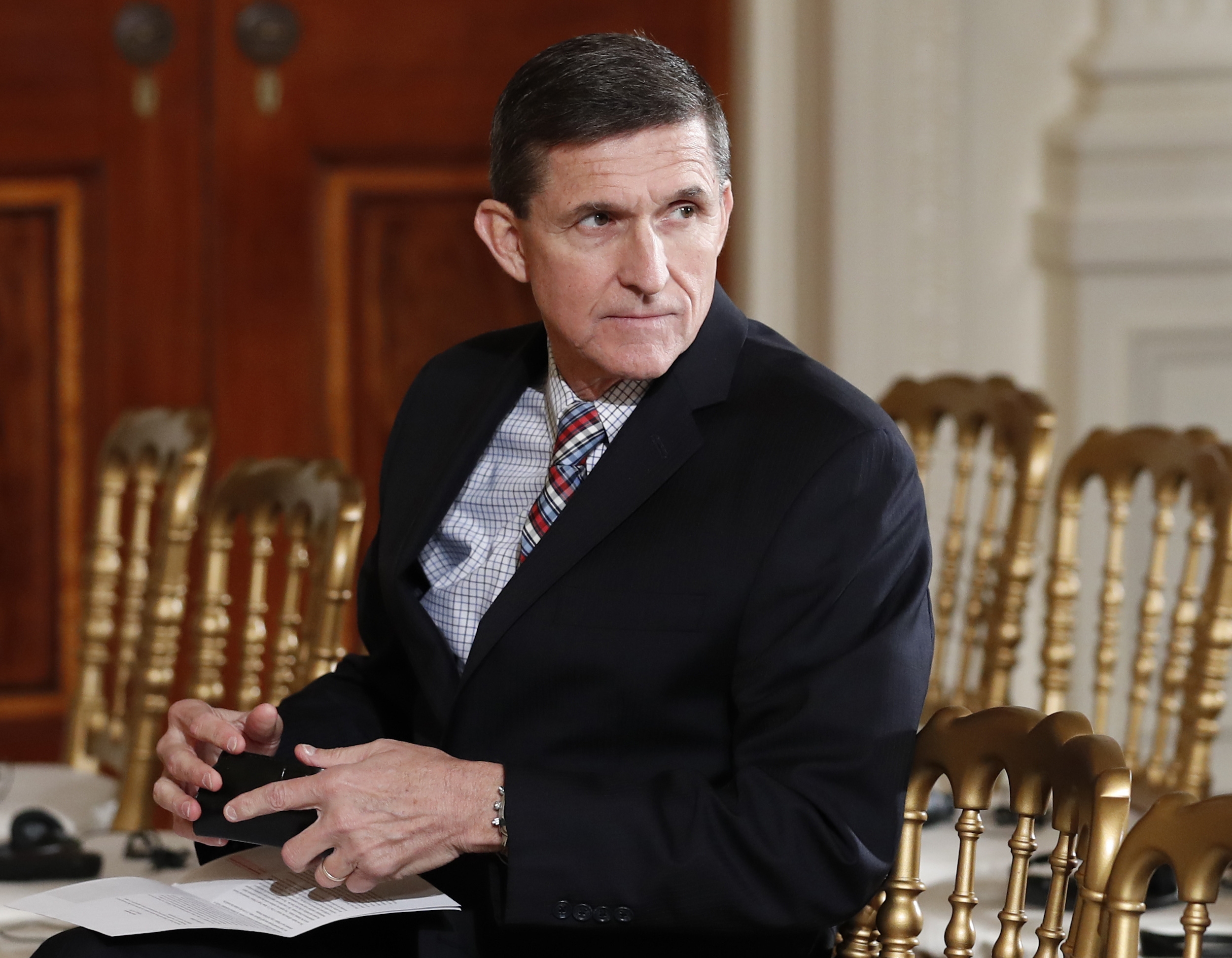 Former officials: Obama warned Trump against hiring Flynn