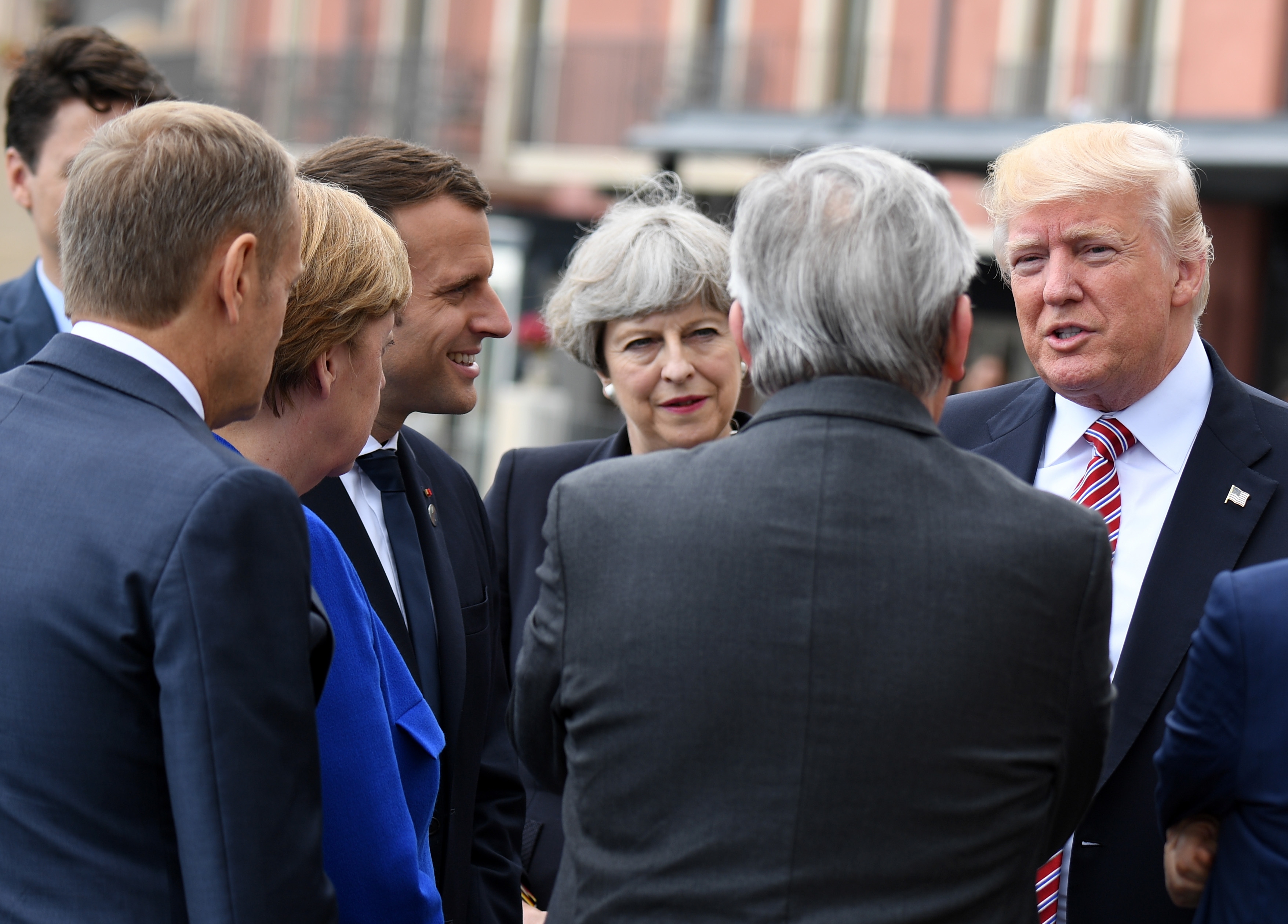 Trump pushes on terror, listens on climate at G-7