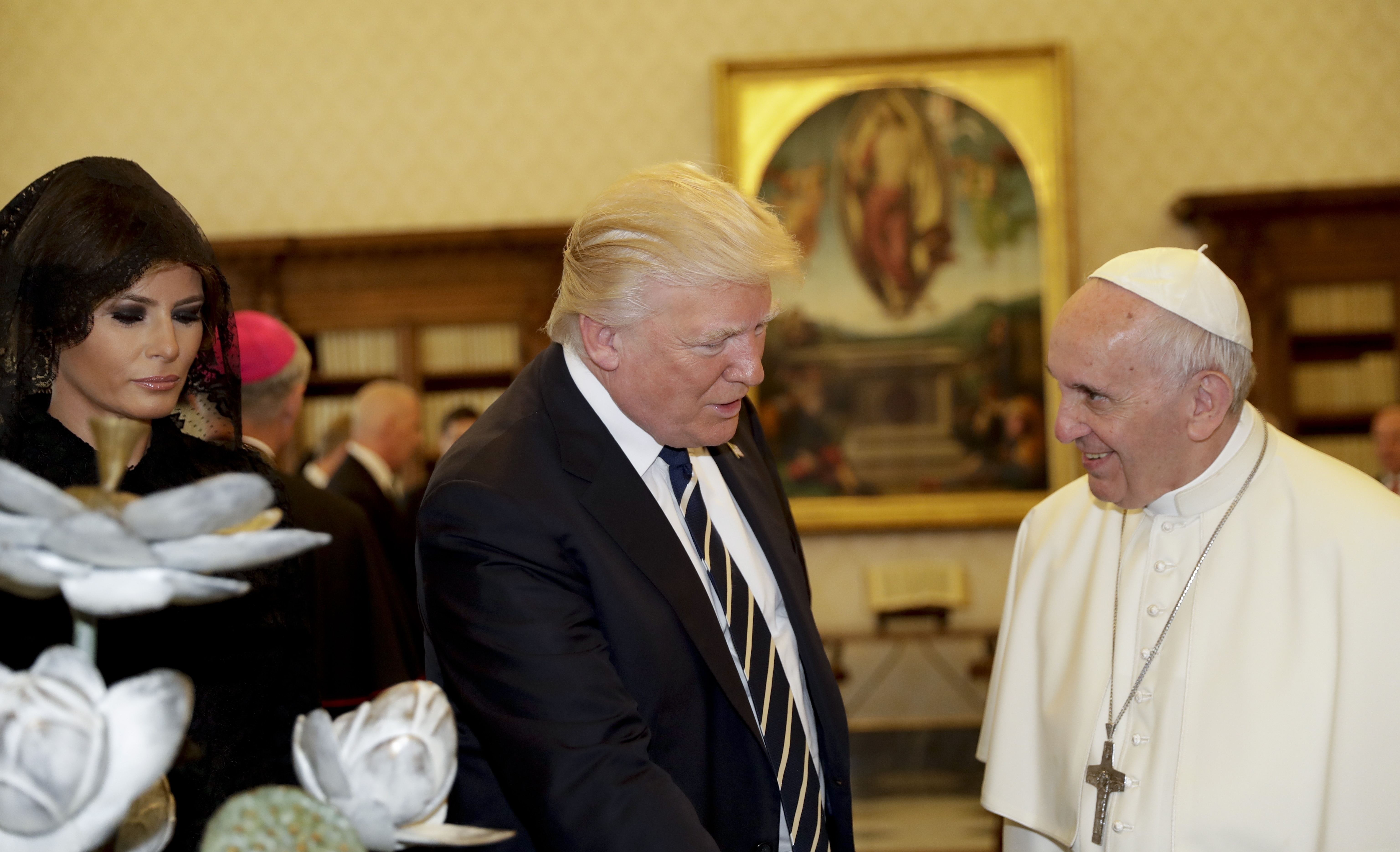Setting aside past rude talk, Trump and pope focus on peace