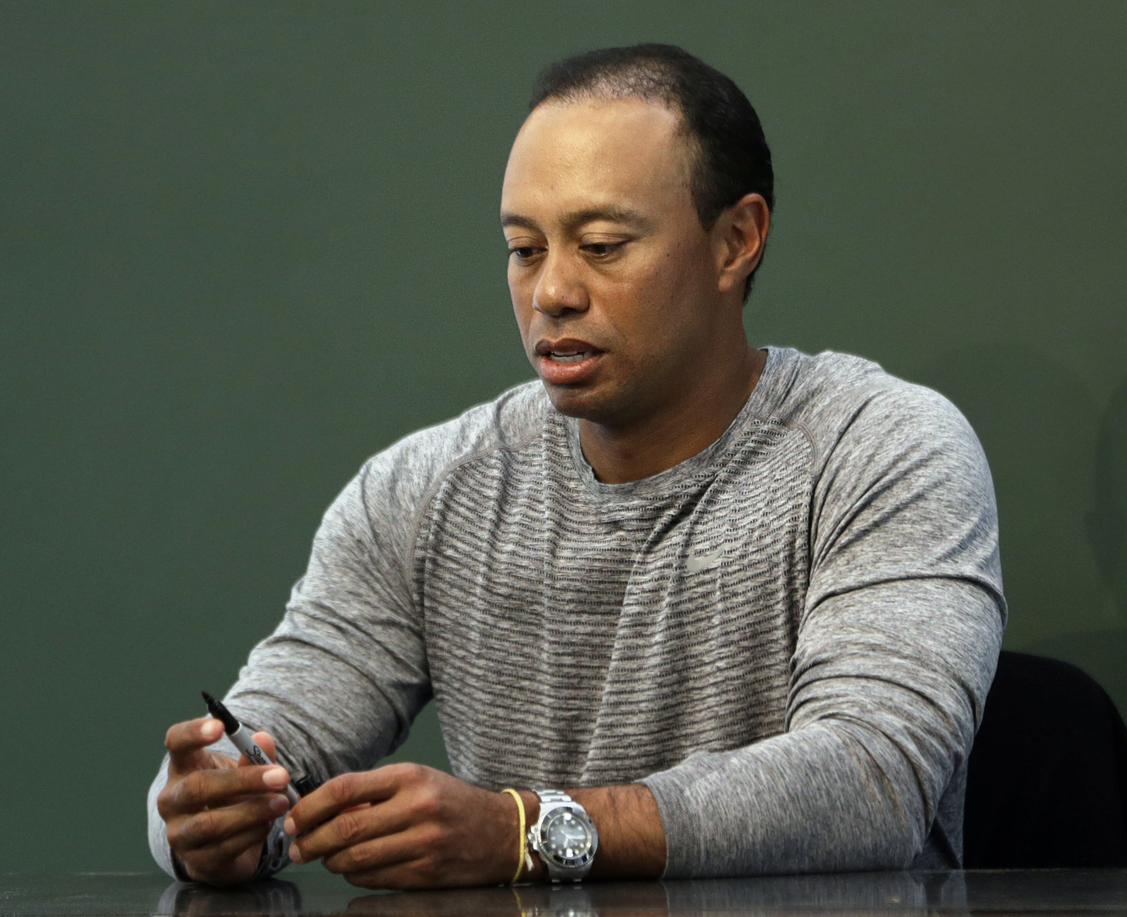 Report: Officers found Woods asleep at the wheel