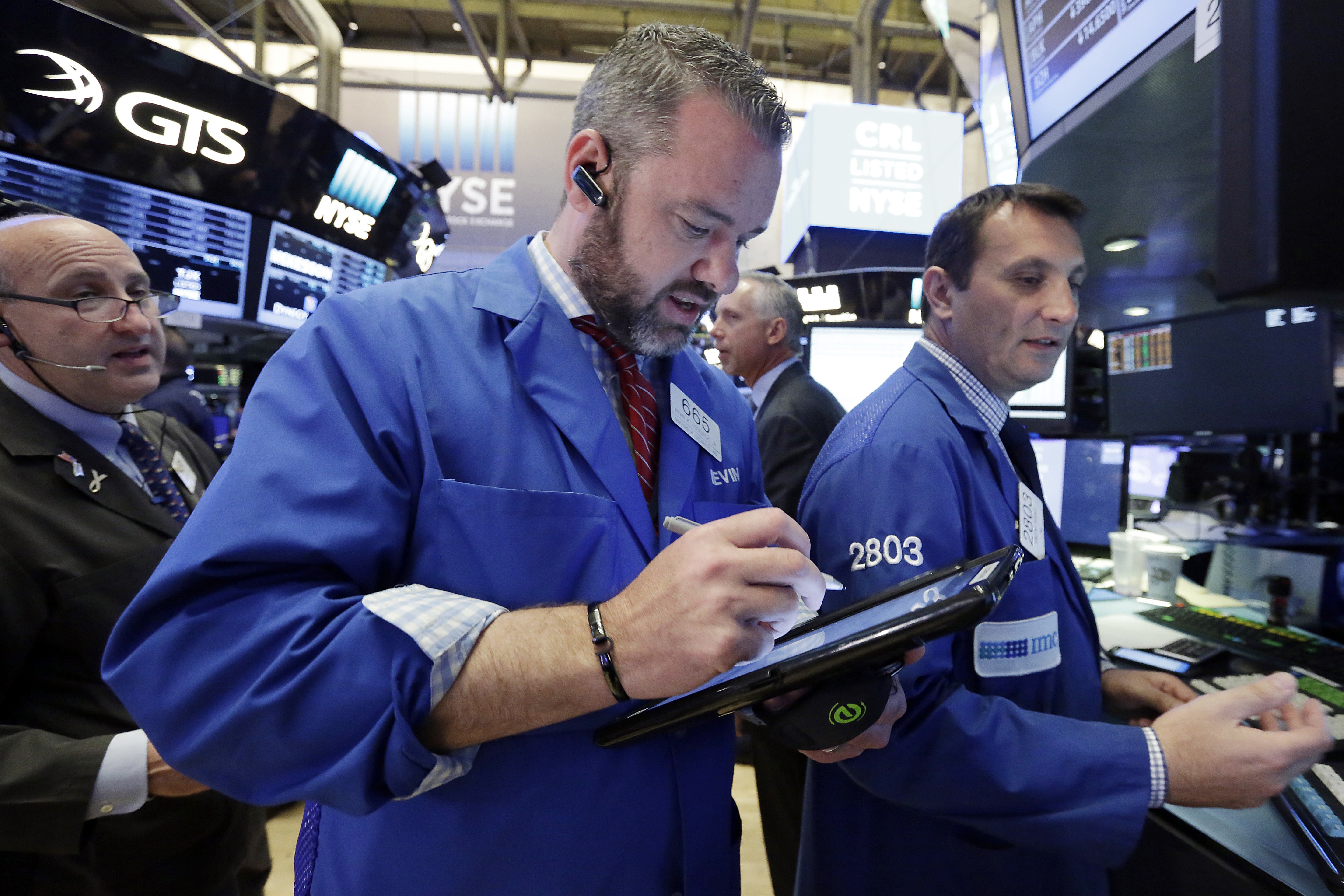 CLOSING BELL: US stock indexes close lower, slide below record high levels