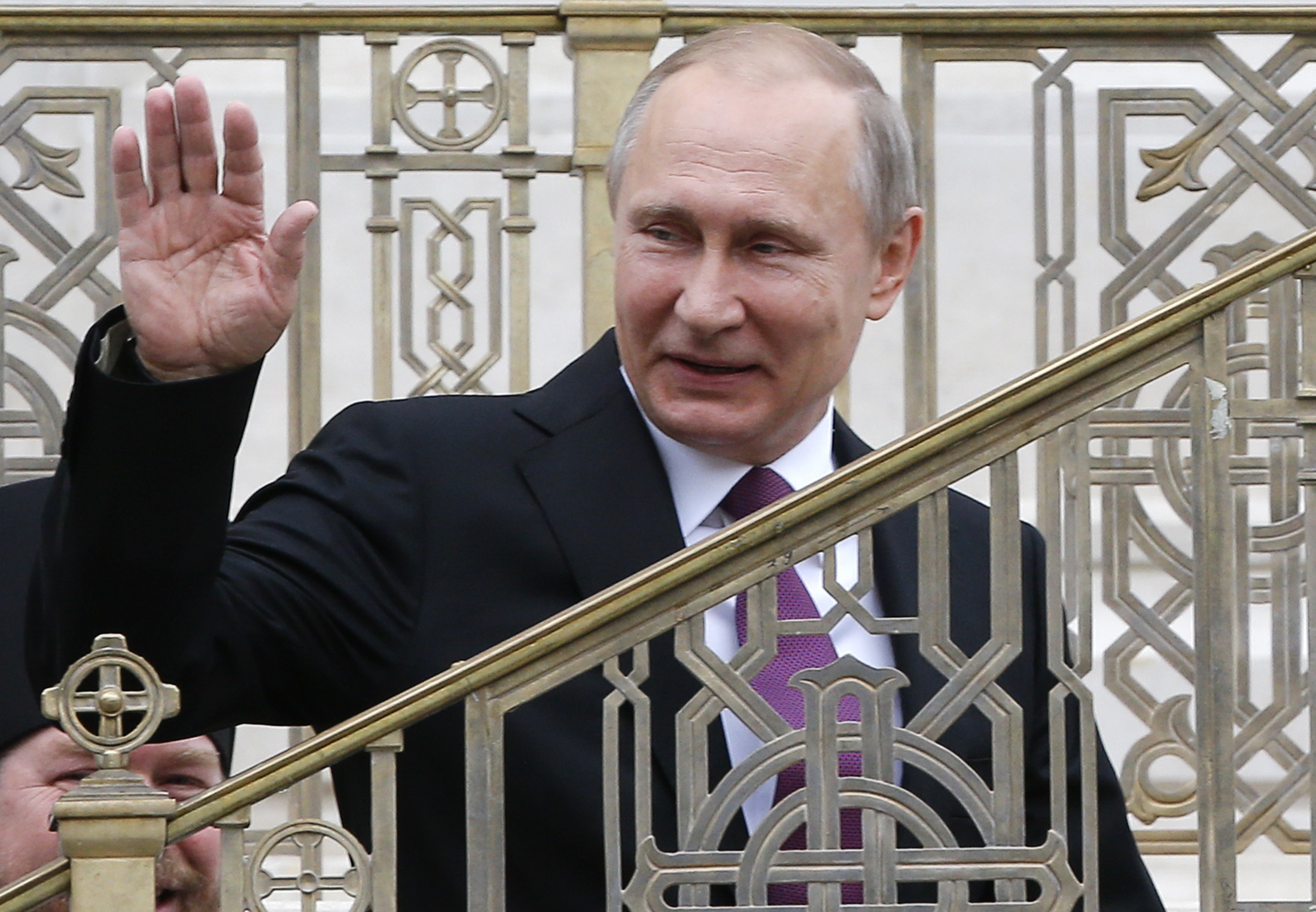Putin denies involvement in hacking, hails Trump
