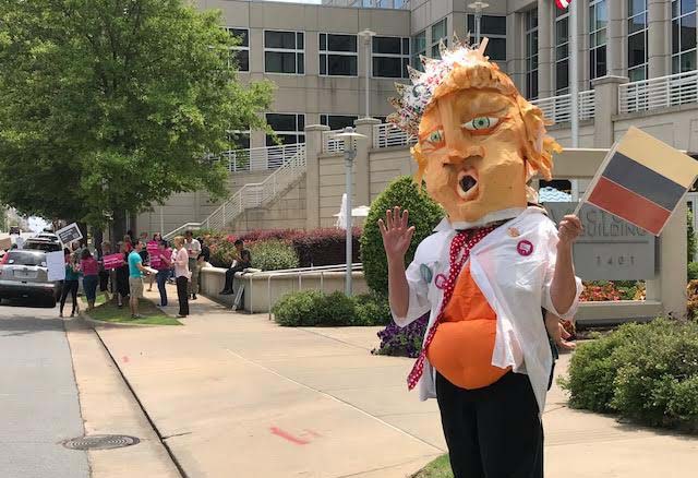 Protesters urge Boozman, Cotton to reject health-care bill