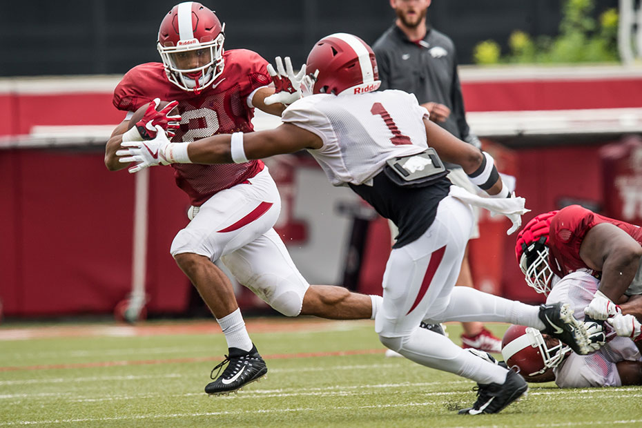 Hogs working to figure out key positions