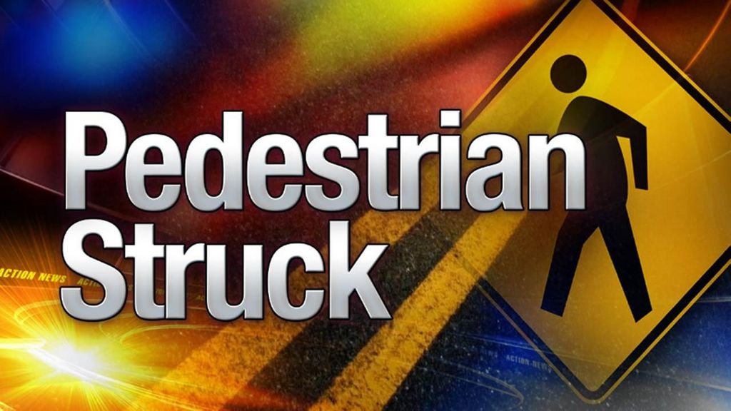 Man killed walking on Olive Street