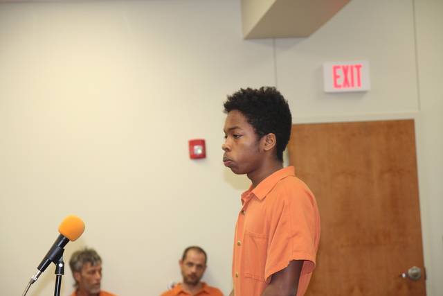 First of 3 murder suspects appears in court