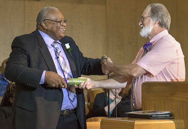 Two churches celebrate “passing the baton”
