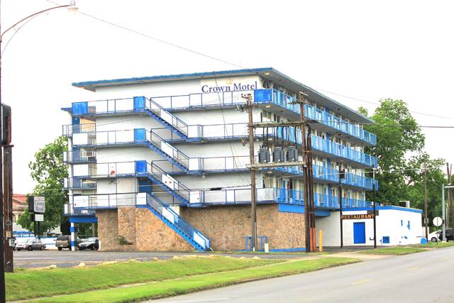 Crown Motel owners pay back taxes, property for sale