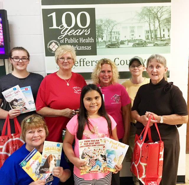 Reading council presents books to Jefferson County health unit