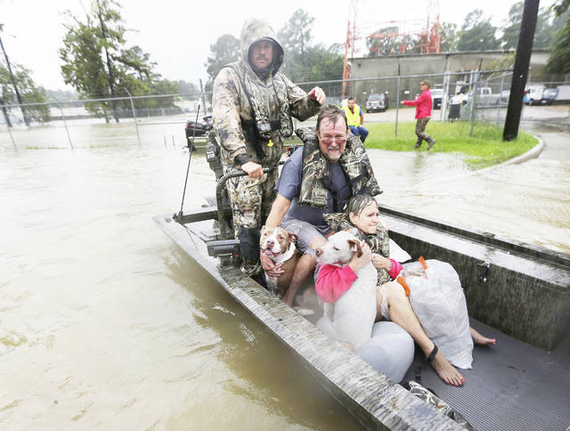 Houston endures more rain and chaos; 6 feared drowned in van