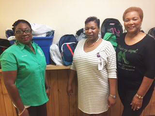 NAUW presents school supplies to DHS