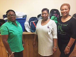 NAUW presents school supplies to DHS | Northwest Arkansas Democrat-Gazette