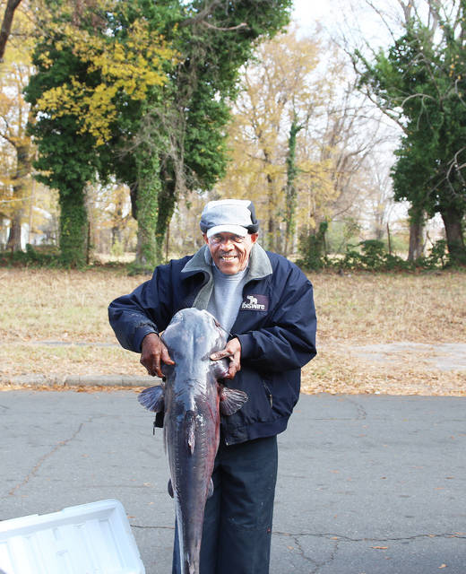 Man catches giant catfish in Lake Saracen