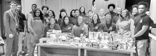 Teen Court volunteers donate toys to ACH kids