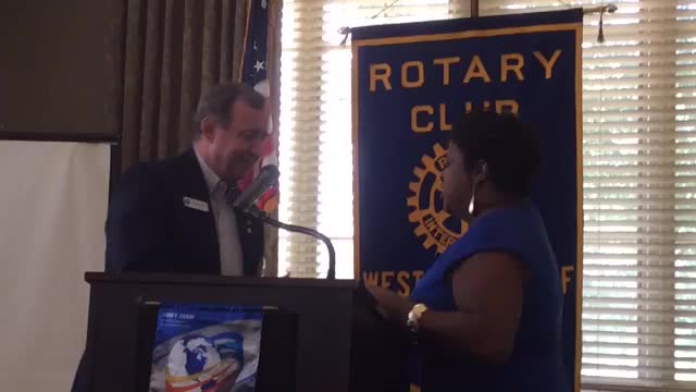 Linda Bateman, the executive director of YouthPartners and the Imagination Library, speaks Thursday at the PB Rotary Club about the library program.
