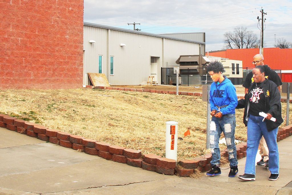 Merrill Center murder suspect returns to Arkansas