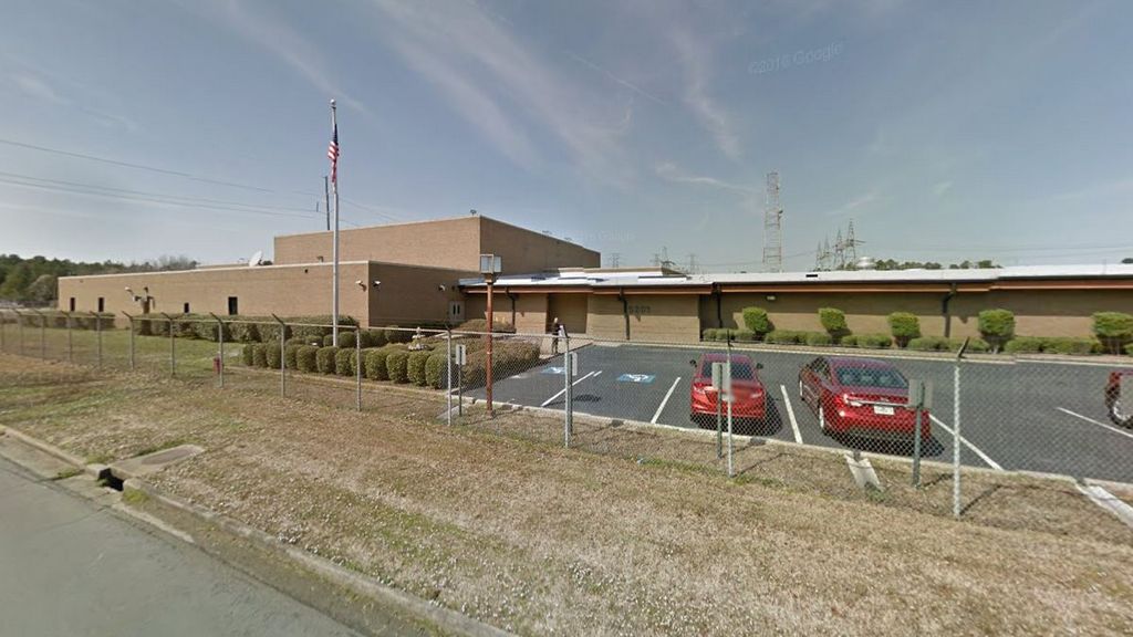 QC accepts donated building on county’s behalf