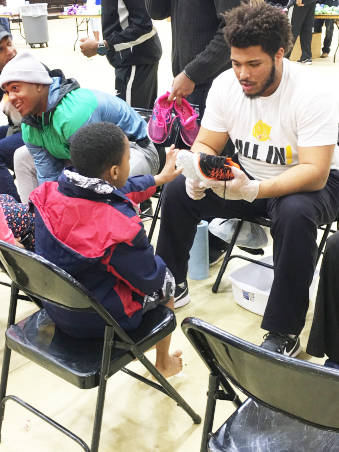 Aramark, UAPB distribute 500 pairs of youth shoes in Jefferson County