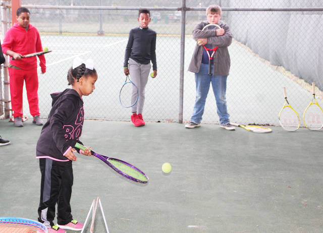 Tennis clinic keeps kids busy during spring break