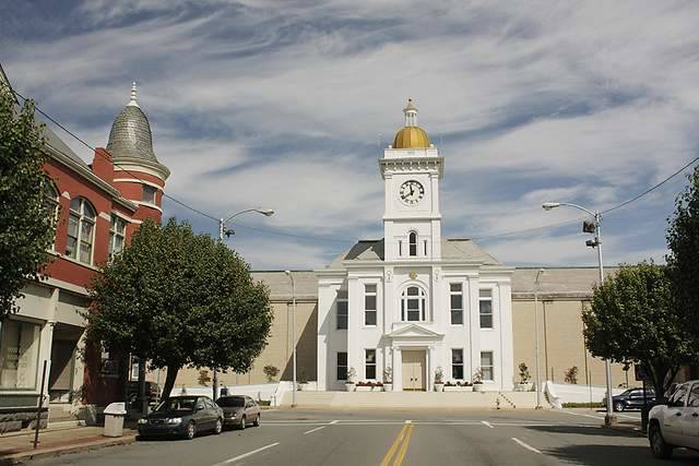 Tempers flare as justices OK energy savings proposal