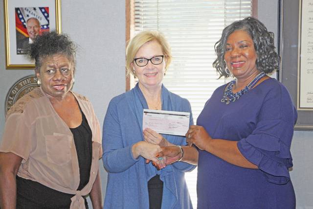 Entergy donates $1K to Area Agency on Aging fan drive