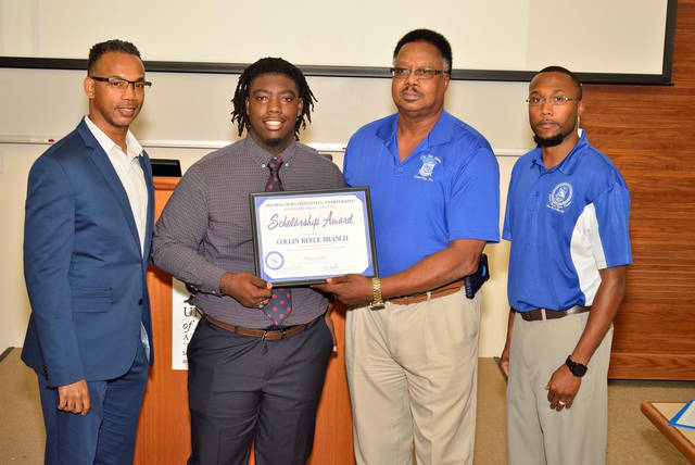 Phi Beta Sigma hosts state meeting, gives scholarship, school supplies