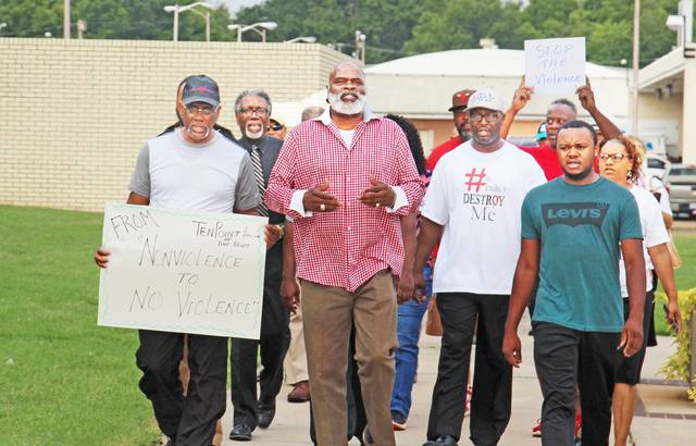 Residents take to streets after another PB slaying