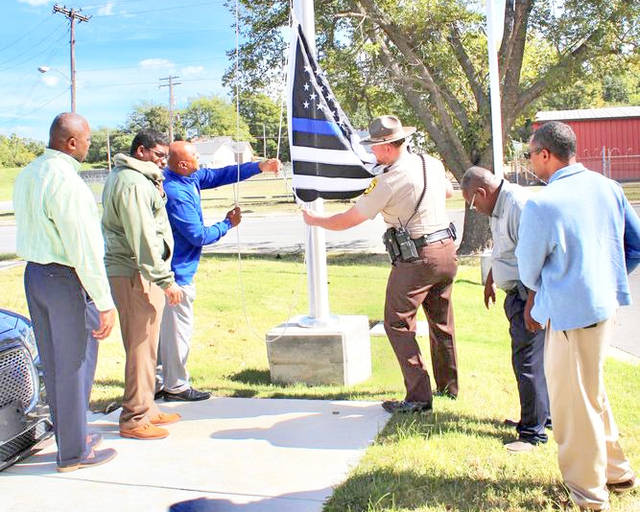 JCSO honors retired lieutenant, friend Columbus Holmes